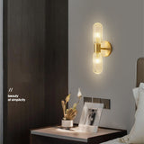 Elegant 2-Light Fluted Glass & Brass Vertical Wall Sconce