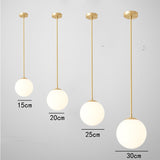 Modern Brass Globe Pendant Light – Minimalist Frosted Glass Sphere