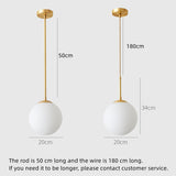 Modern Brass Globe Pendant Light – Minimalist Frosted Glass Sphere