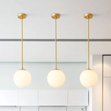 Modern Brass Globe Pendant Light – Minimalist Frosted Glass Sphere