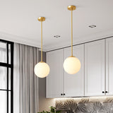 Modern Brass Globe Pendant Light – Minimalist Frosted Glass Sphere