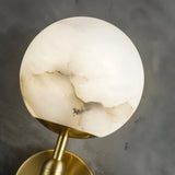 Modern Alabaster Globe Wall Sconce with Brushed Brass Finish
